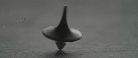 An animated gif of the spinning top from the movie Inception