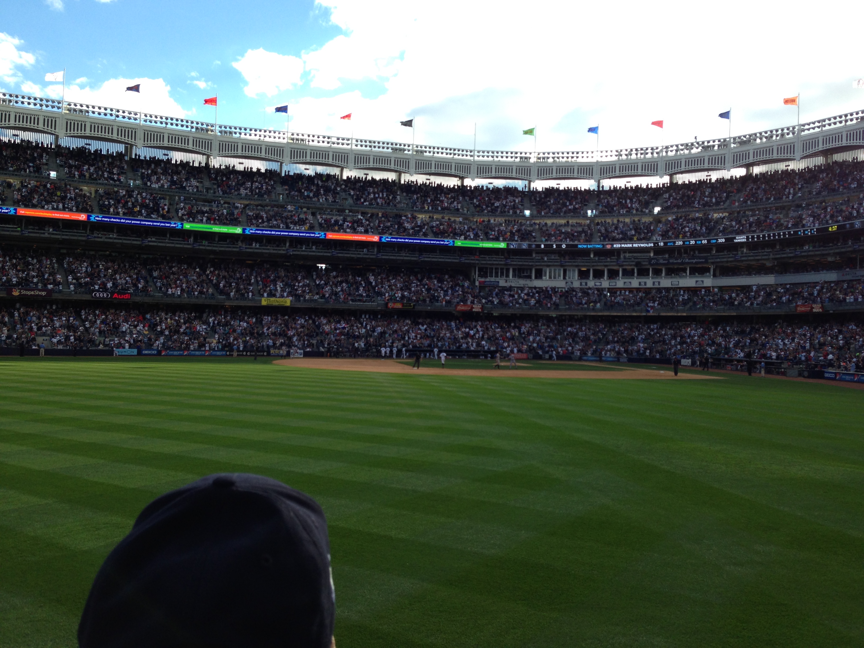 A photo of Yankee stadium looking out to home plate from center field