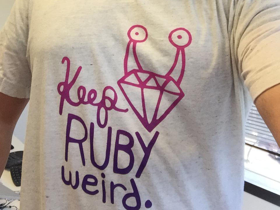Keep Ruby Weird logo in a pink purple gradient on a white shirt